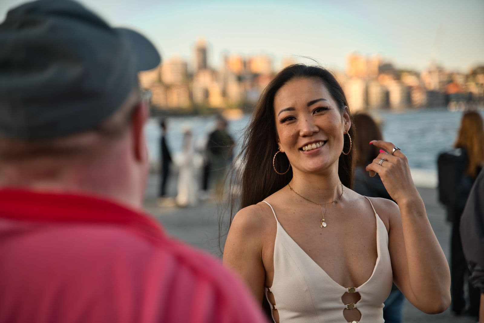 A smiling Sydney local beside the harbour